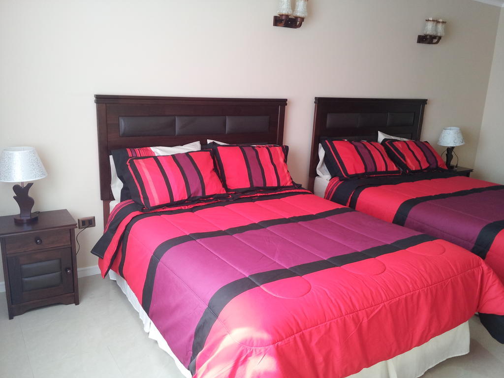 Hotel Astore Suites Antofagasta Rum bild